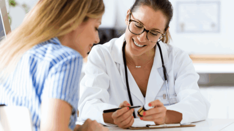 Doctor explaining medication to a patient during a Suboxone consultation for opioid addiction treatment, highlighting safe, supportive care