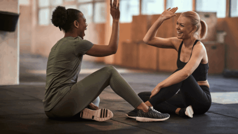 Women celebrating post-workout, symbolizing how GLP-1 weight loss medications and lifestyle changes can support PCOS symptom management and improved health