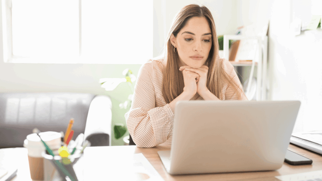 Woman searching online for affordable alternatives to rehab