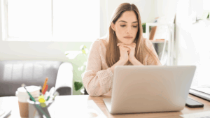 Woman searching online for affordable alternatives to rehab