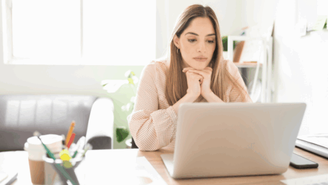 Woman searching online for affordable alternatives to rehab