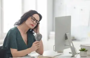 woman experiencing a hot flash