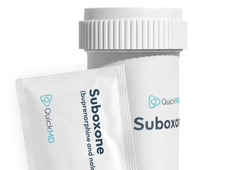 QuickMD Suboxone (buprenorphine and naloxone) medication bottle and film strip packet on white background