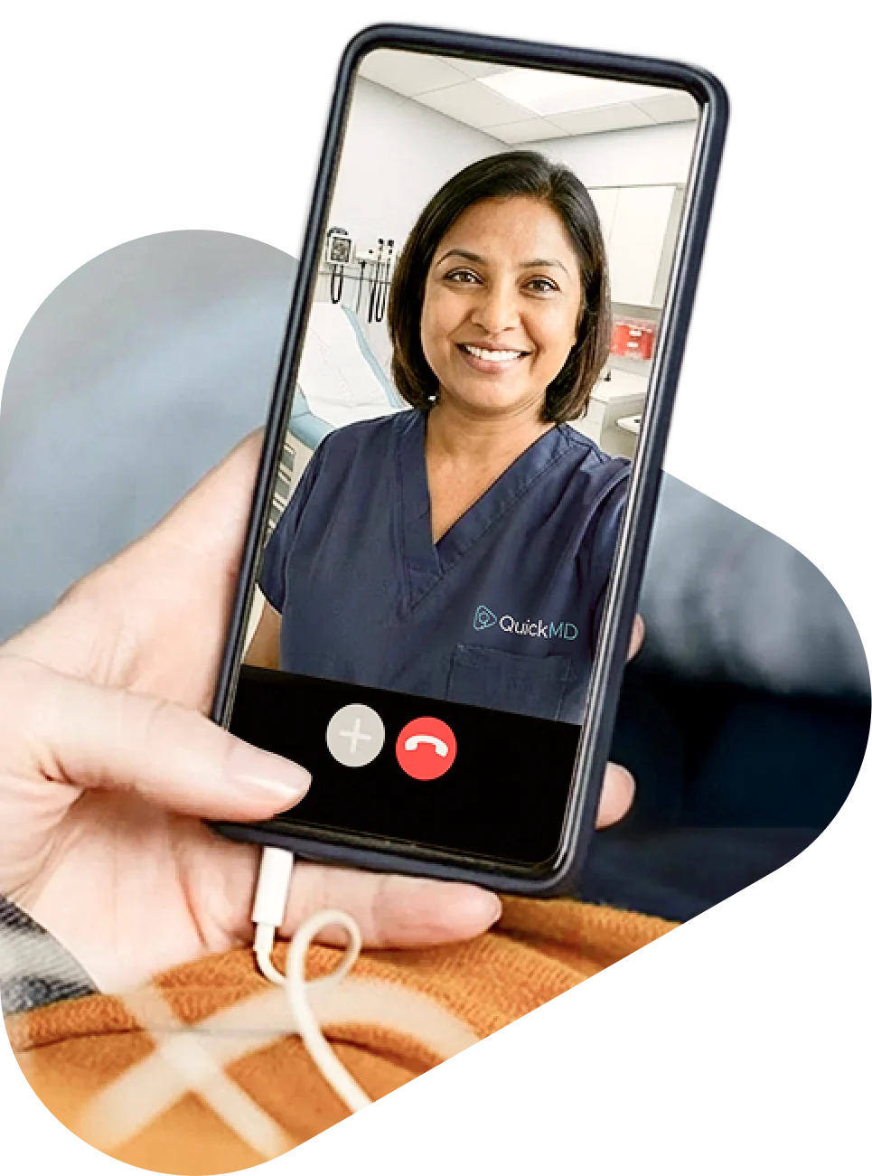 Patient holding smartphone during a QuickMD online counseling video call