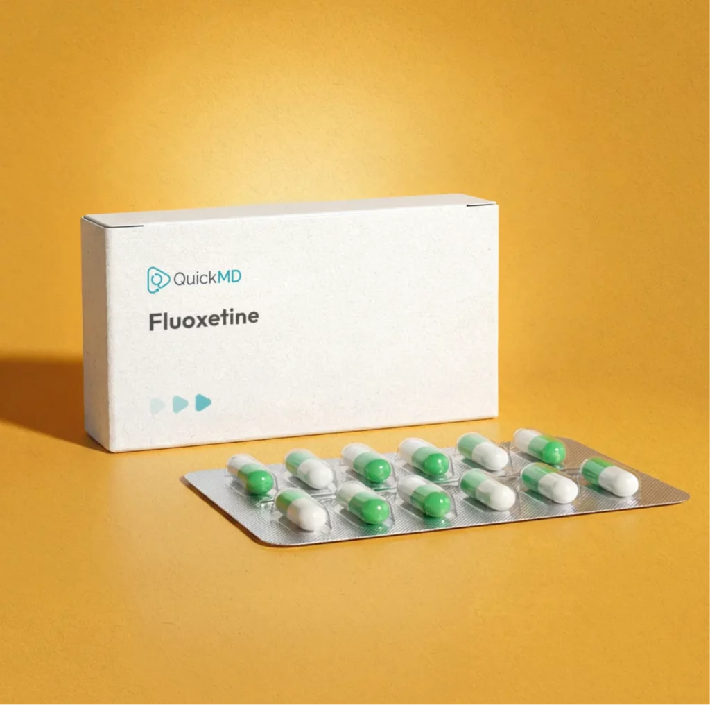 QuickMD Fluoxetine medication box with green and white capsules in a blister pack on a yellow background