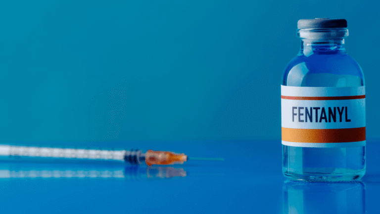 Image of a vial labeled 'Fentanyl' next to a syringe