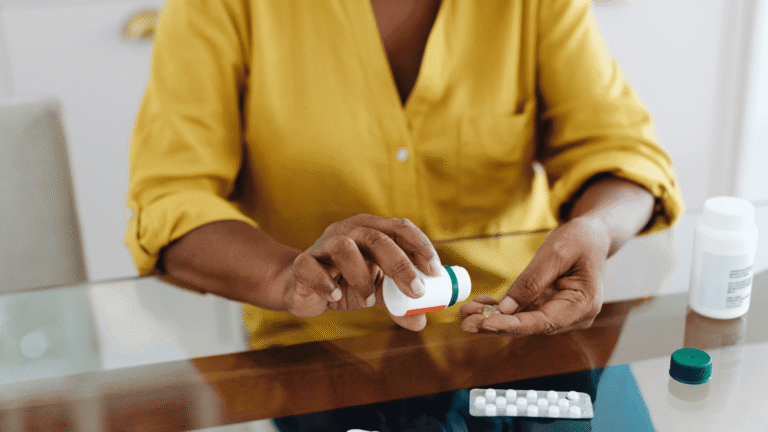 Woman dispensing pills