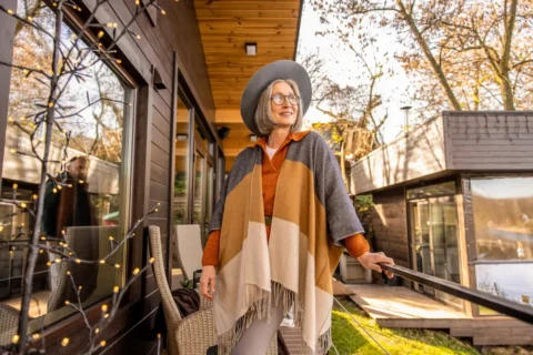 Middle aged woman standing outside