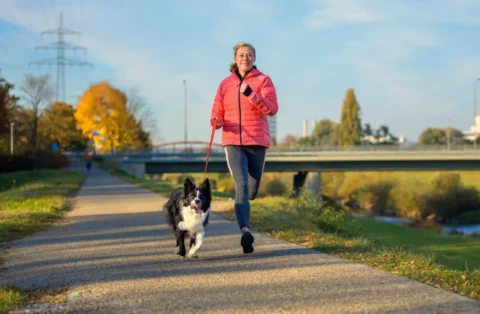 woman-running-with-her-dog-for-exercise
