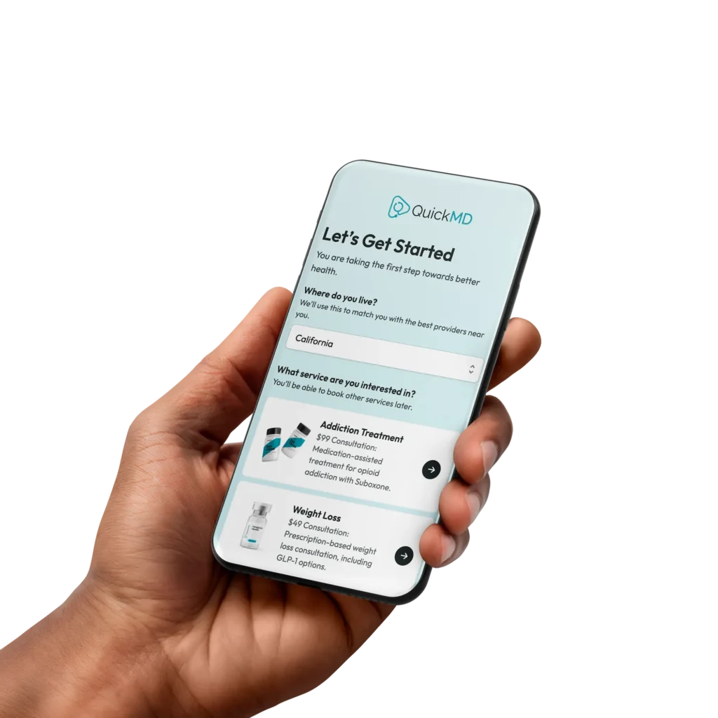Person holding phone picking their type of treatment from QuickMD
