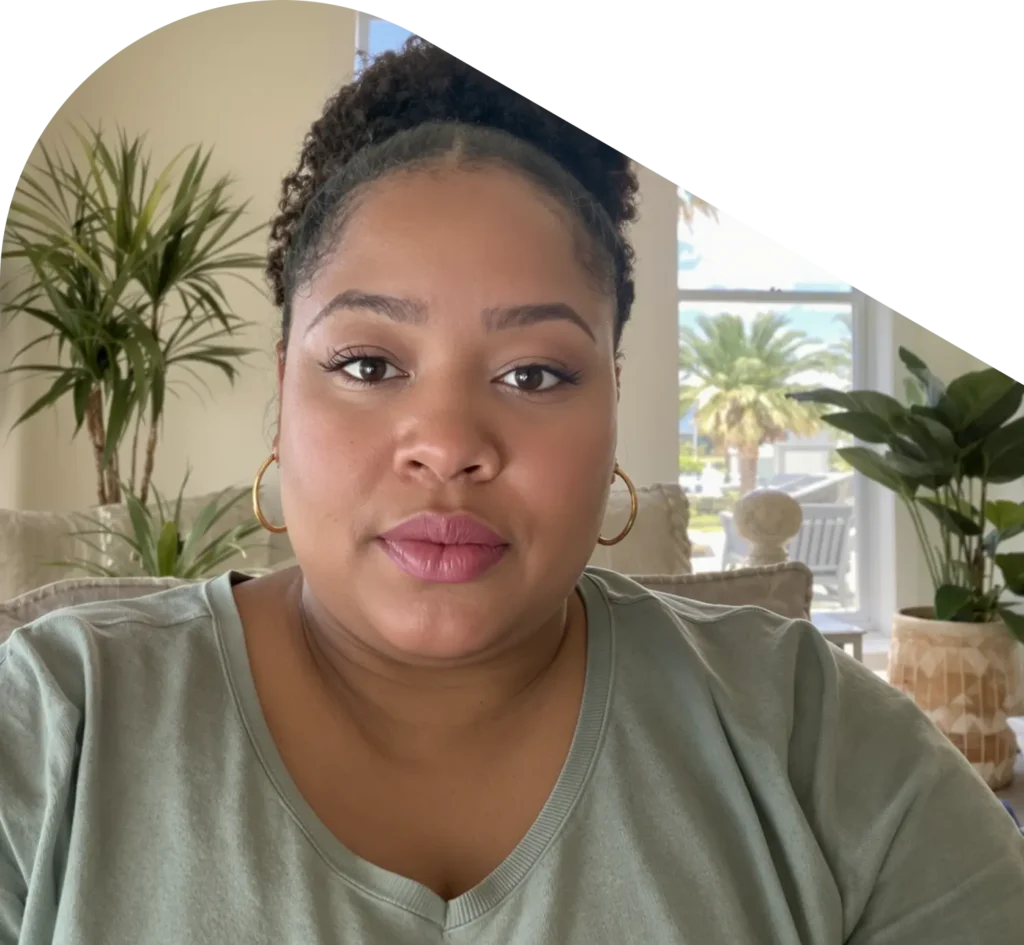 Woman in living room on a QuickMD telehealth call