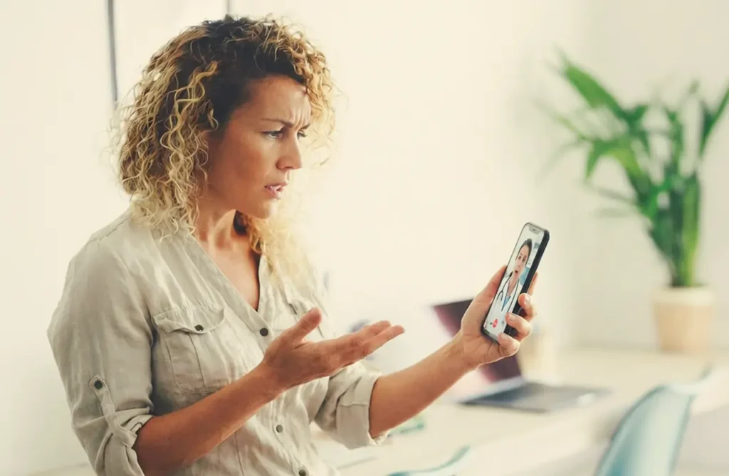 woman-consulting-doctor-online-about-hrt